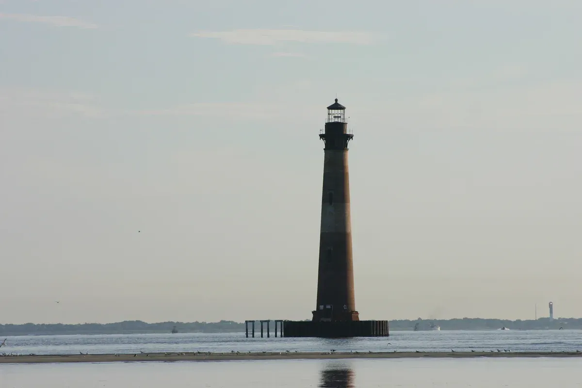 Morris Island Lighthouse standing in the water near Charleston, the sight of a Morris Island lighthouse boat tour